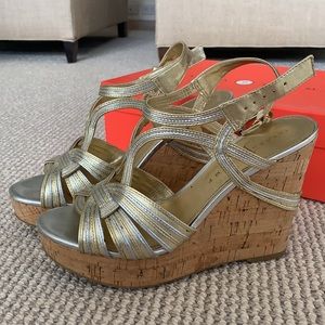 Ivanka Trump gold and silver cork wedges. Size 7.5